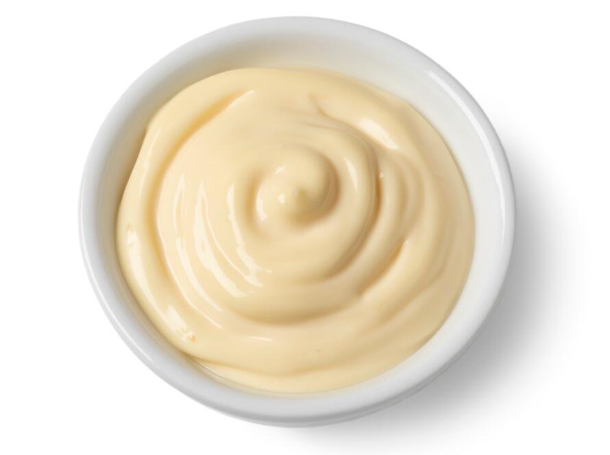 Bowl with Mayonnaise on white background
